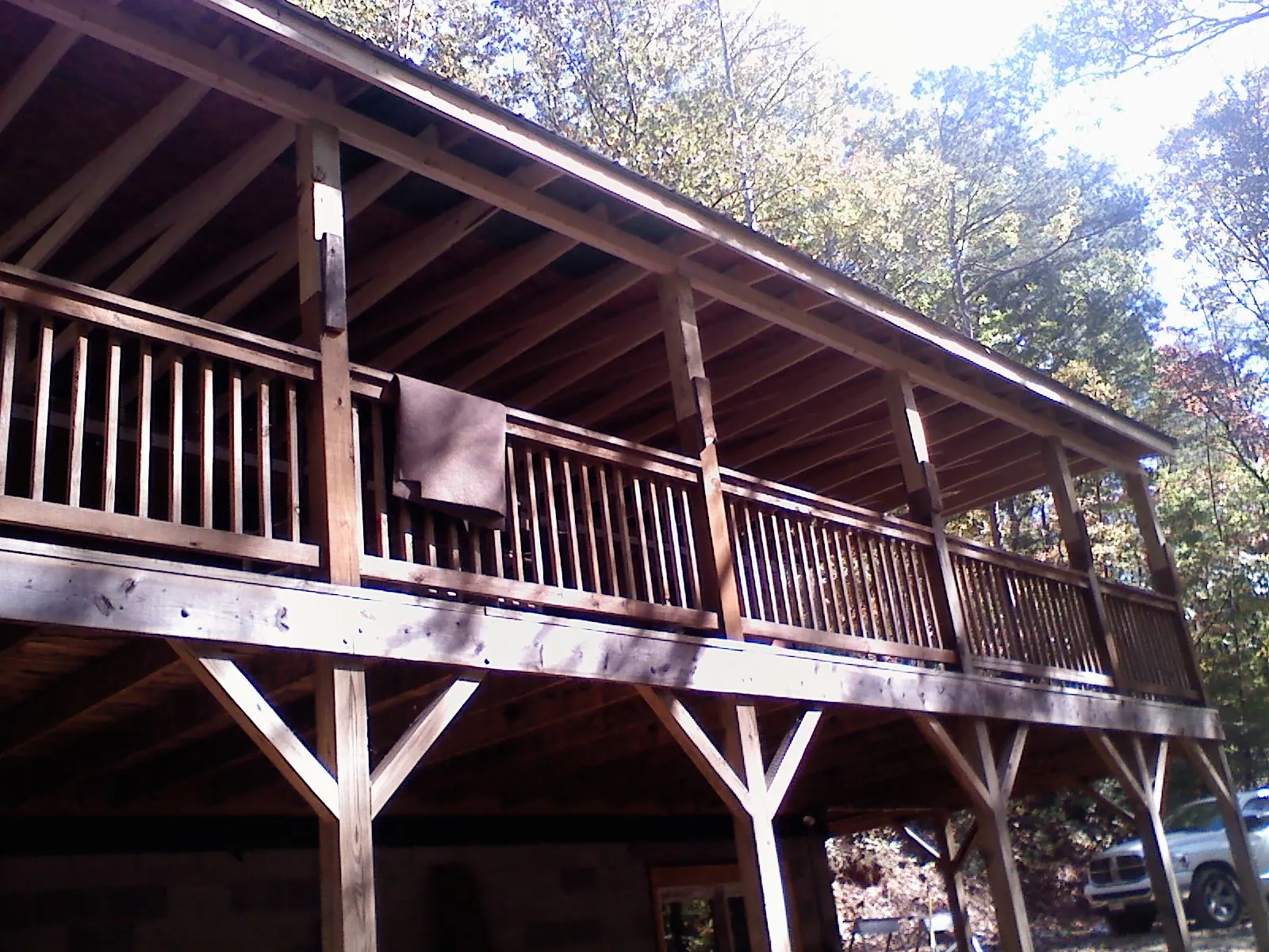 Timber framing under a new elevated porch and deck — Roof Leak Repair in Wyandanch by Roofing Brothers